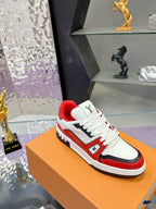 White, red and black Louis Vuitton sneaker with lace-up front and LV logo on tongue