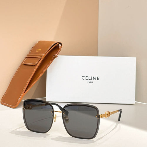 Celine glasses with dark frames and smoked lenses, gold-tone accents and arms