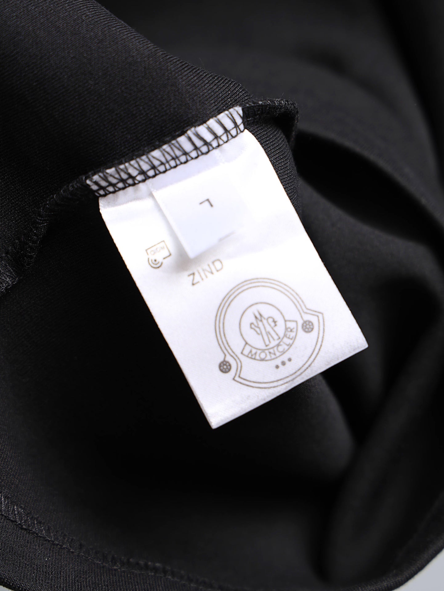 Moncler black T-shirt with interior size label and care tag at collar