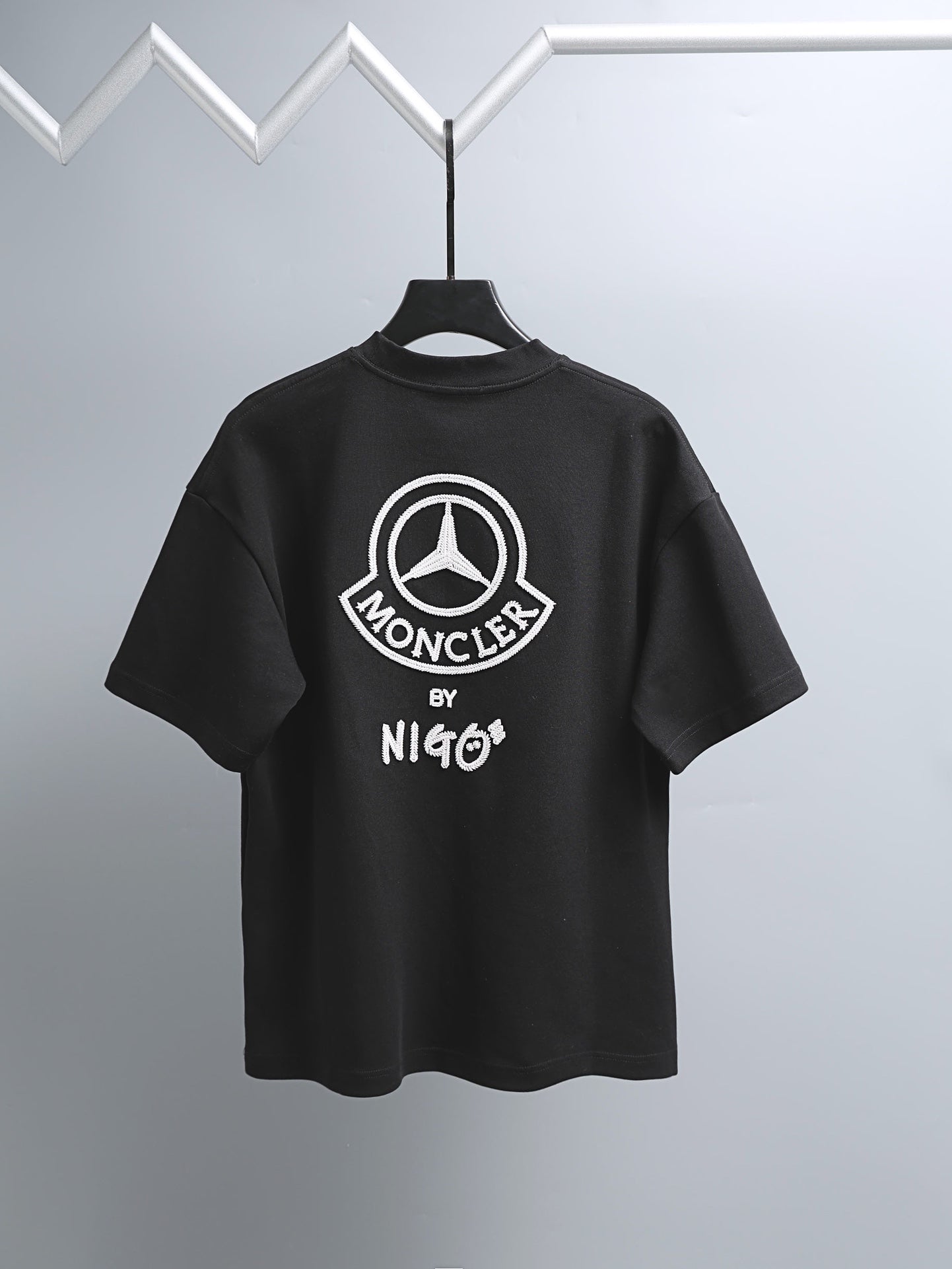 Black short-sleeve T-shirt with Moncler logo graphic