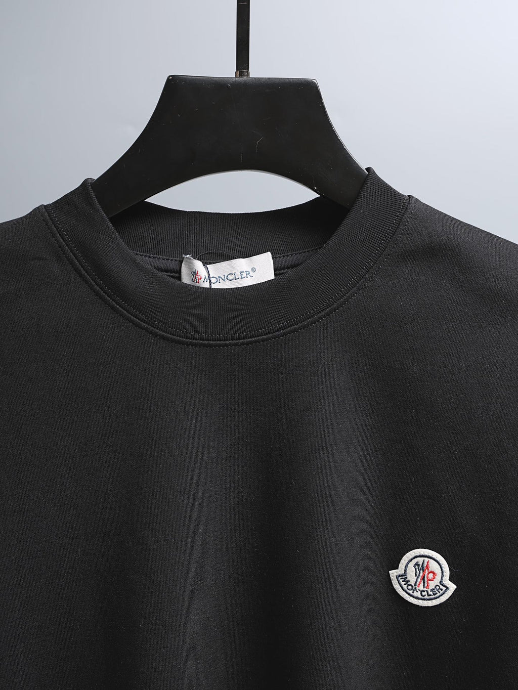 Moncler black short-sleeve T-shirt with ribbed crew neck and chest logo patch