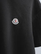 Moncler black short-sleeve T-shirt with round chest logo emblem