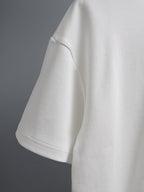 White short-sleeve T-shirt with smooth fabric and curved side seam