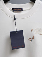 White crewneck T-shirt with hanging brand tag and embroidered bird graphics on chest