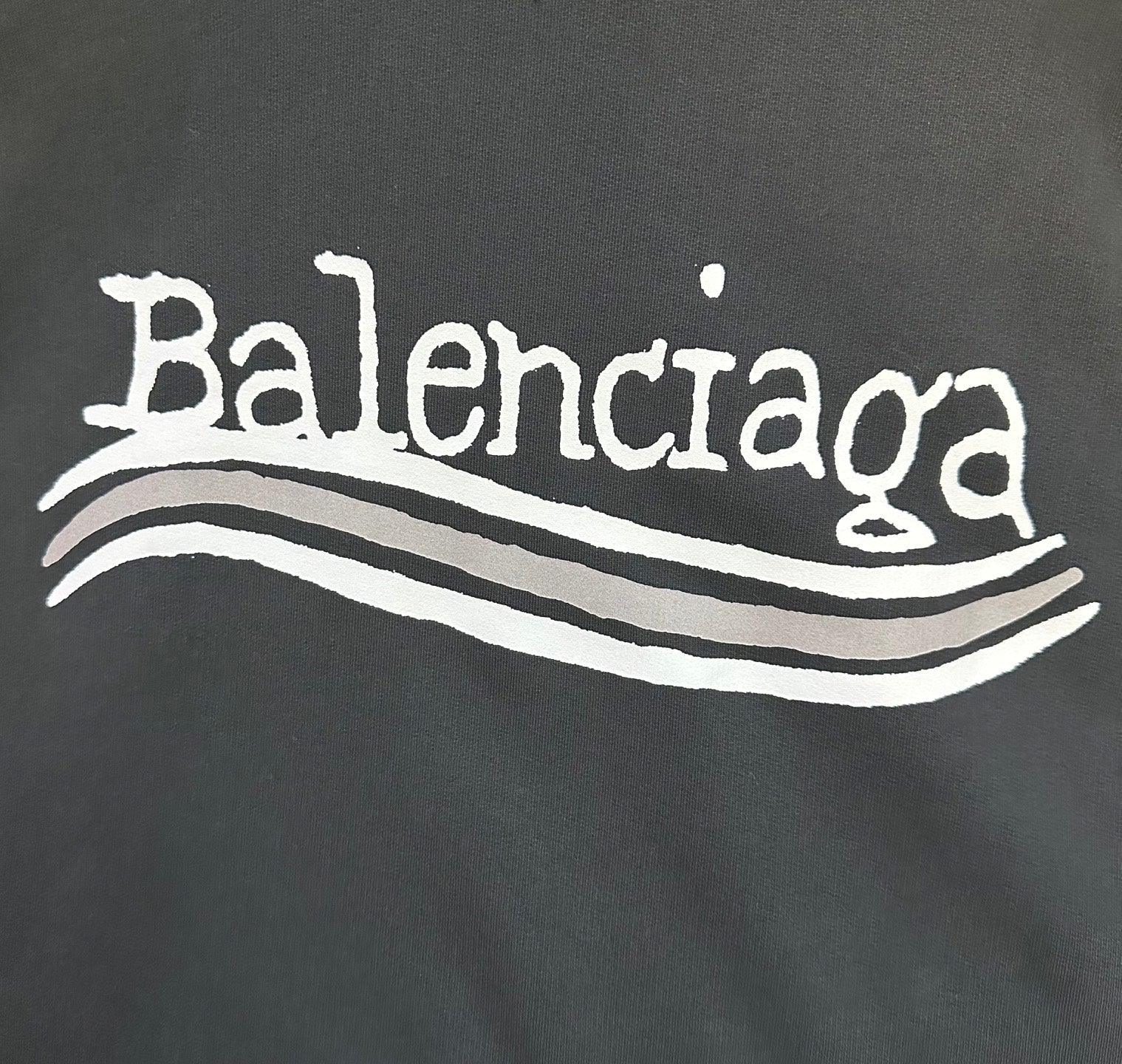 Balenciaga logo print on black hoodie fabric