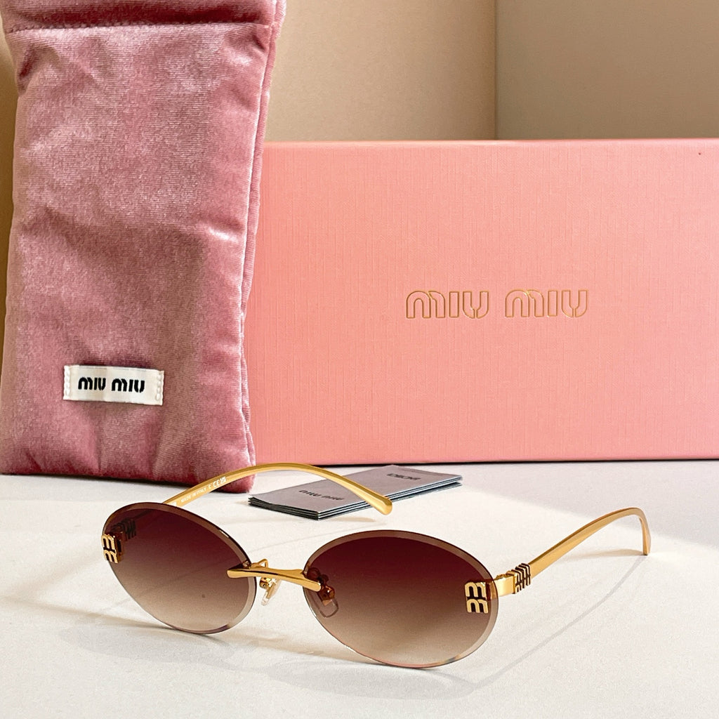 MiuMiu oval sunglasses with gold-tone frame and warm brown gradient lenses