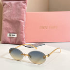 MiuMiu oval sunglasses with gold-tone frame and dark gradient lenses