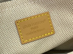 Orange fabric label with Louis Vuitton Paris and made in France text