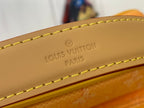 Orange leather strap with Louis Vuitton Paris imprint and yellow contrast stitching