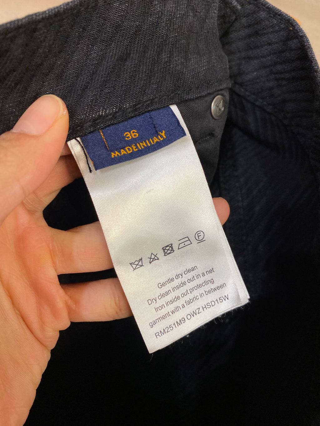 Louis Vuitton pants care label and size tag inside waistband