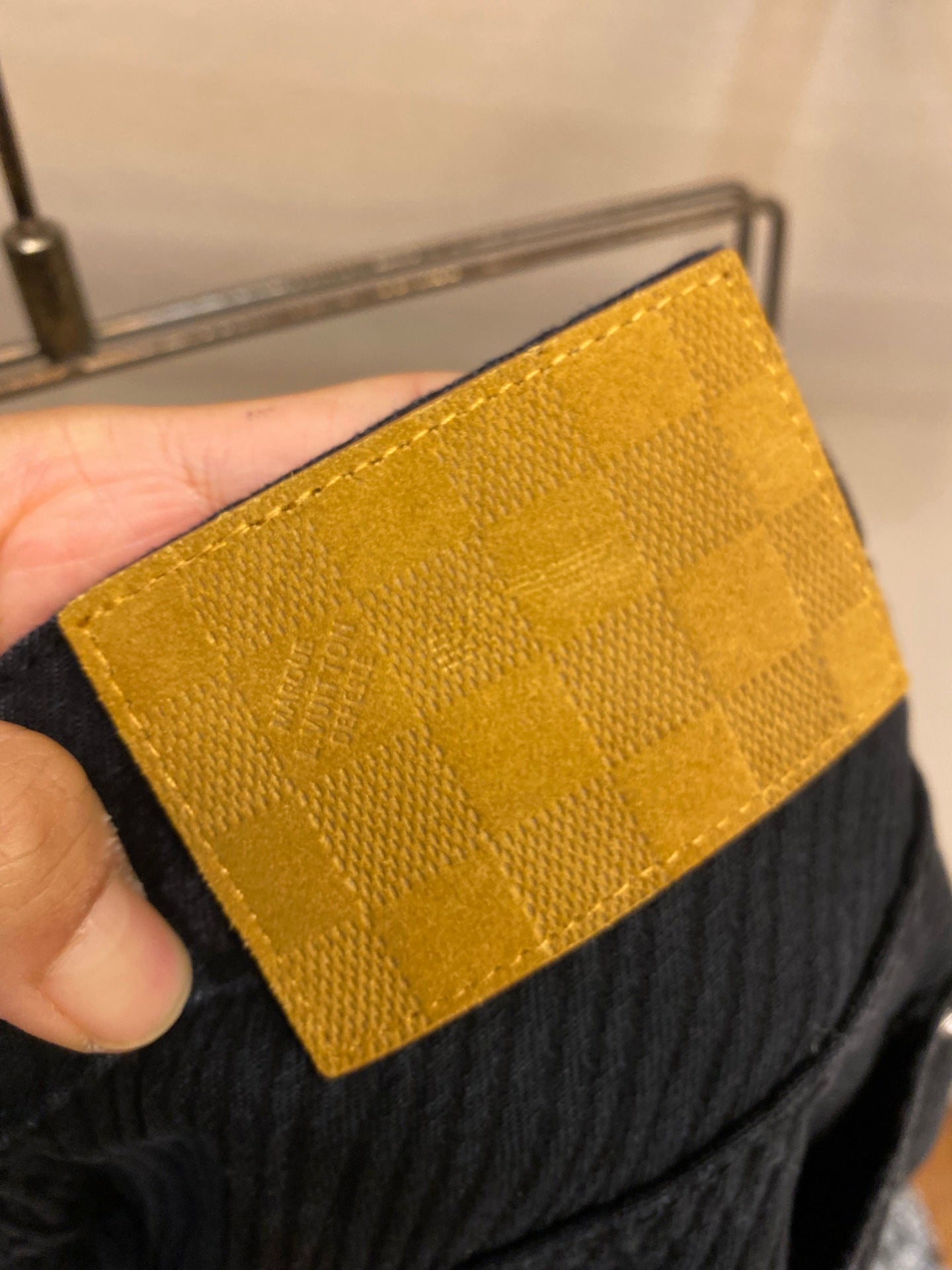 Louis Vuitton pants yellow leather patch label on waistband