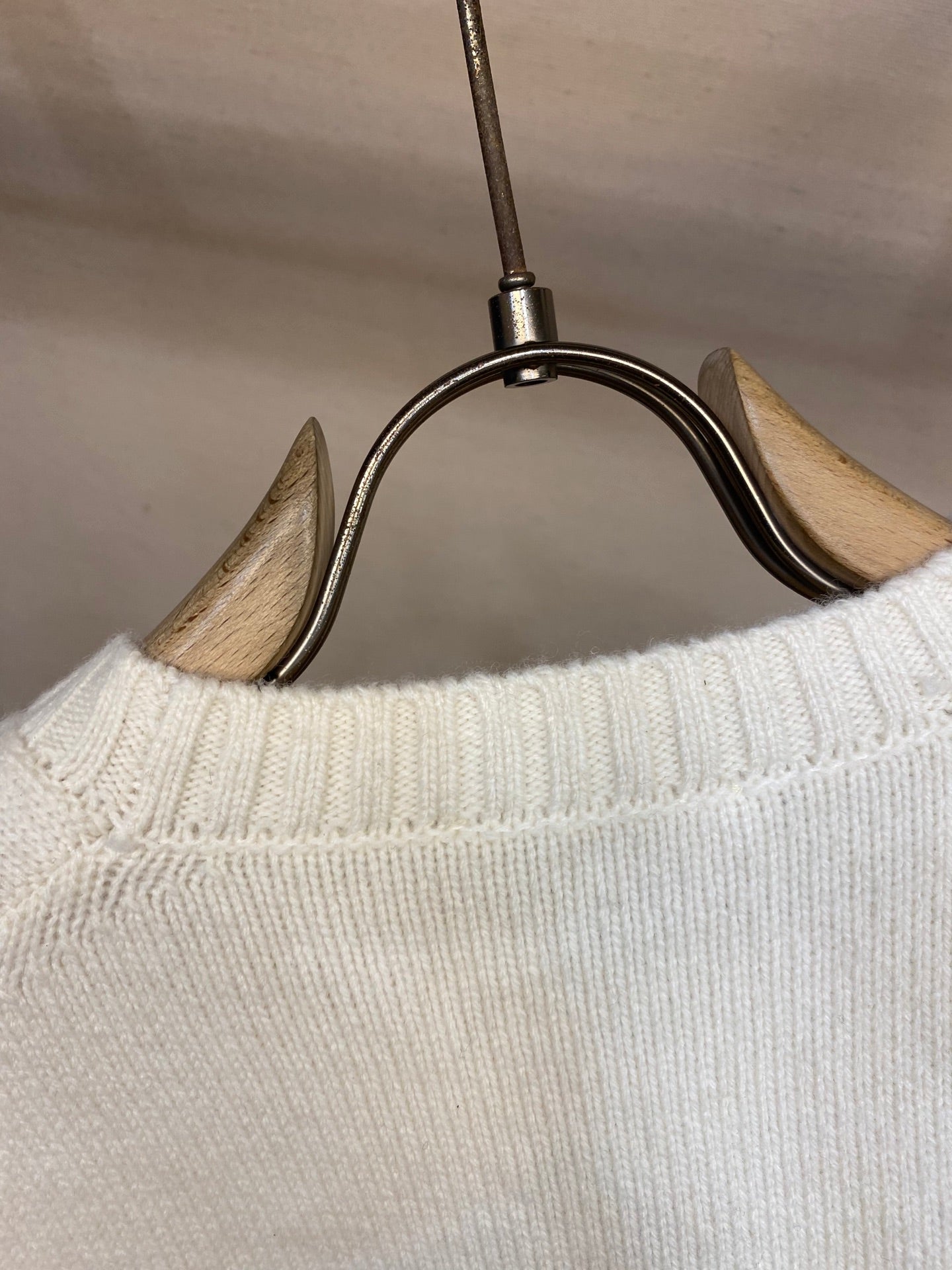 Cream ribbed knit crew collar detail on long-sleeve sweater