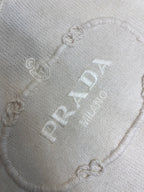 Cream knit texture with PRADA chain and logo embroidery detail