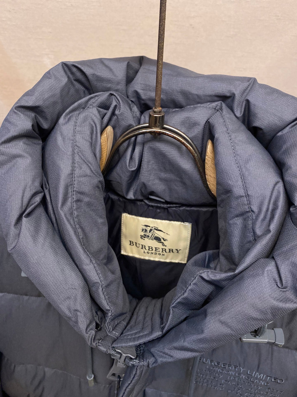 Inside hood lining with Burberry label and drawstring cords