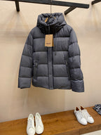 Long puffer jacket in dark gray with hood and front zipper