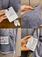 Moncler light gray puffer jacket, hang tags and size label shown