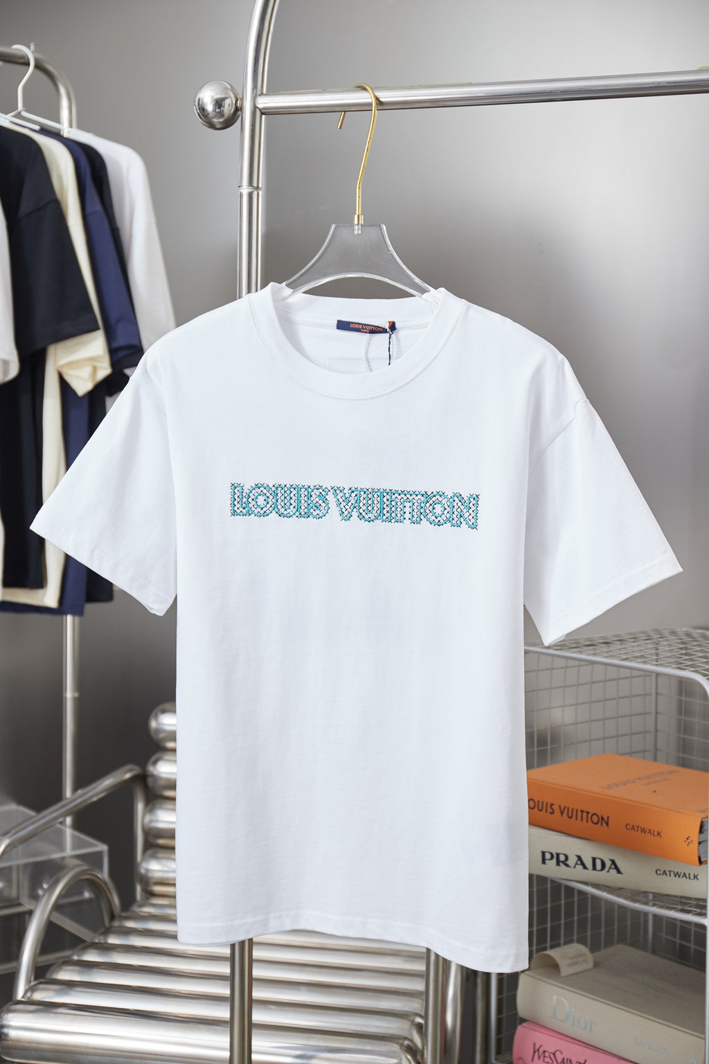 Louis Vuitton logo T-shirt in white with turquoise front graphic print