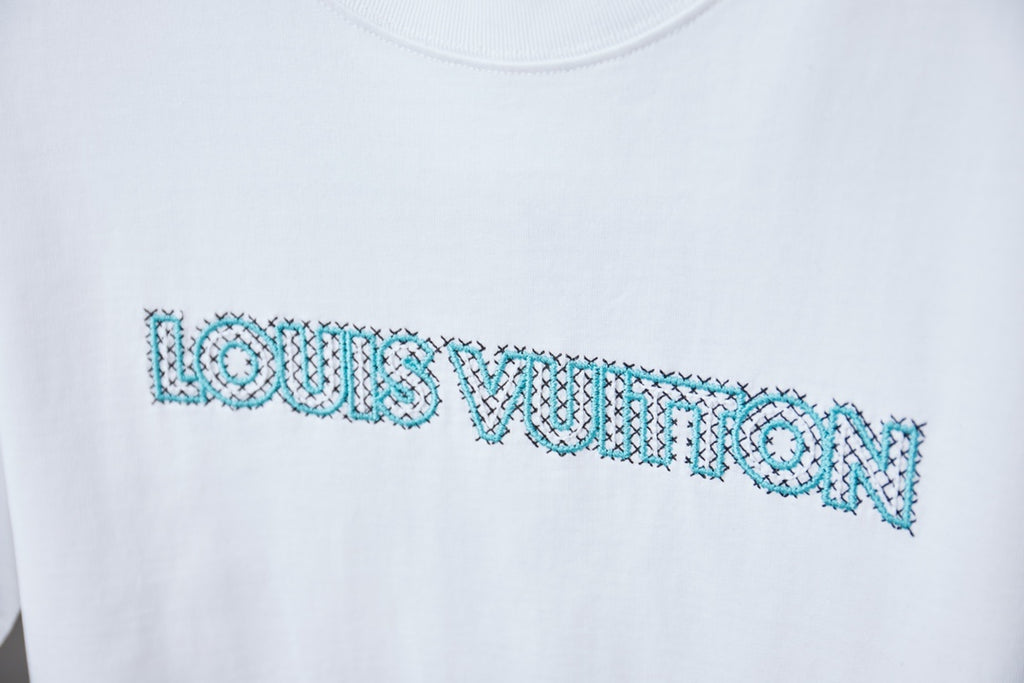 Louis Vuitton logo T-shirt close-up of turquoise embroidered-style front text