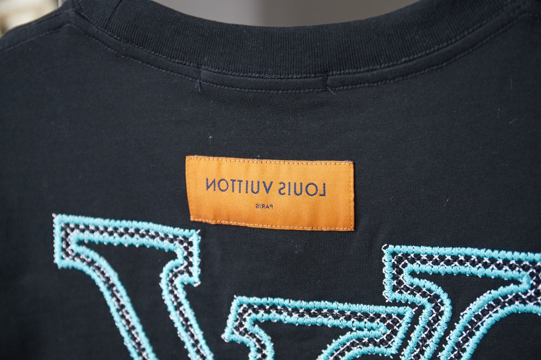 Louis Vuitton dark navy T-shirt neckline with logo and orange label