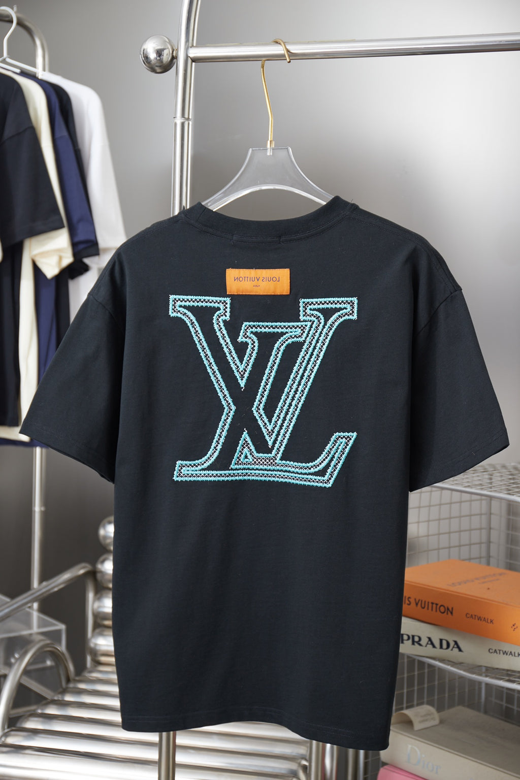 Louis Vuitton dark navy T-shirt with large light blue logo on back