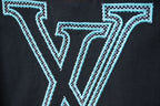 Louis Vuitton dark navy T-shirt close-up of light blue LV letters