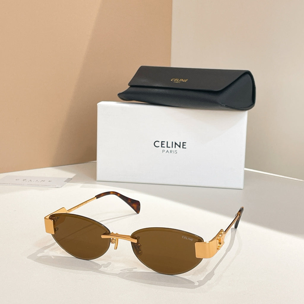 Sunglasses with gold-tone frame and brown lenses with black case