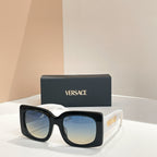 Black square sunglasses with mirrored blue lenses and VERSACE logo on temple