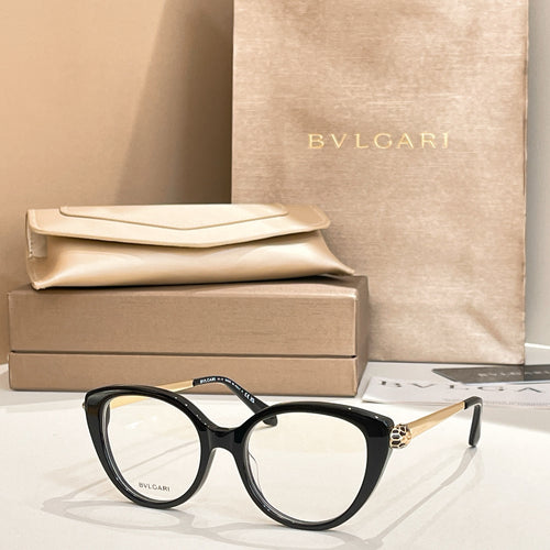 Black round eyeglasses with gold-tone temple detail