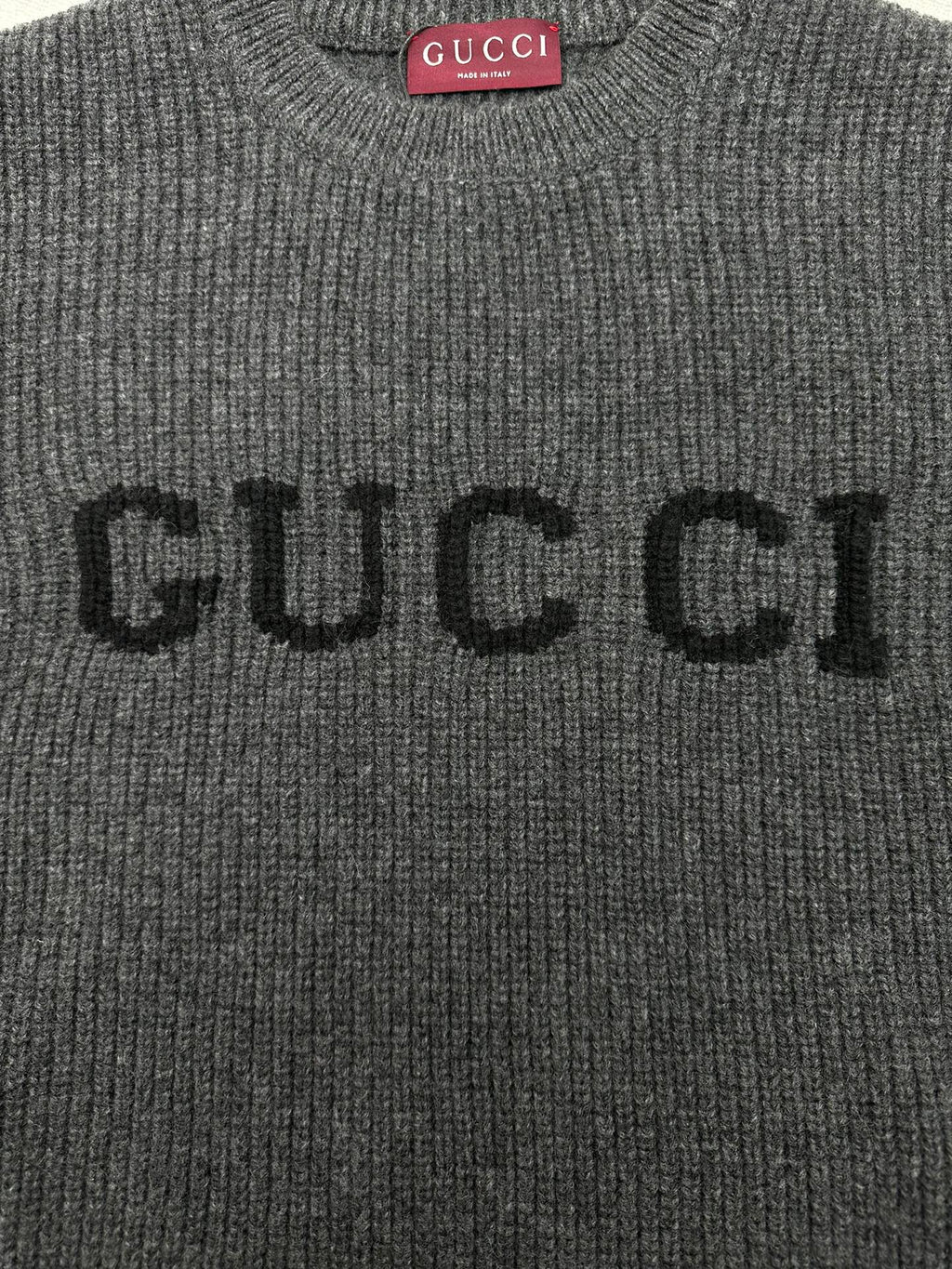 Gucci knit sweater front with embroidered GUCCI lettering
