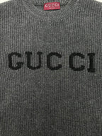 Gucci knit sweater front with embroidered GUCCI lettering