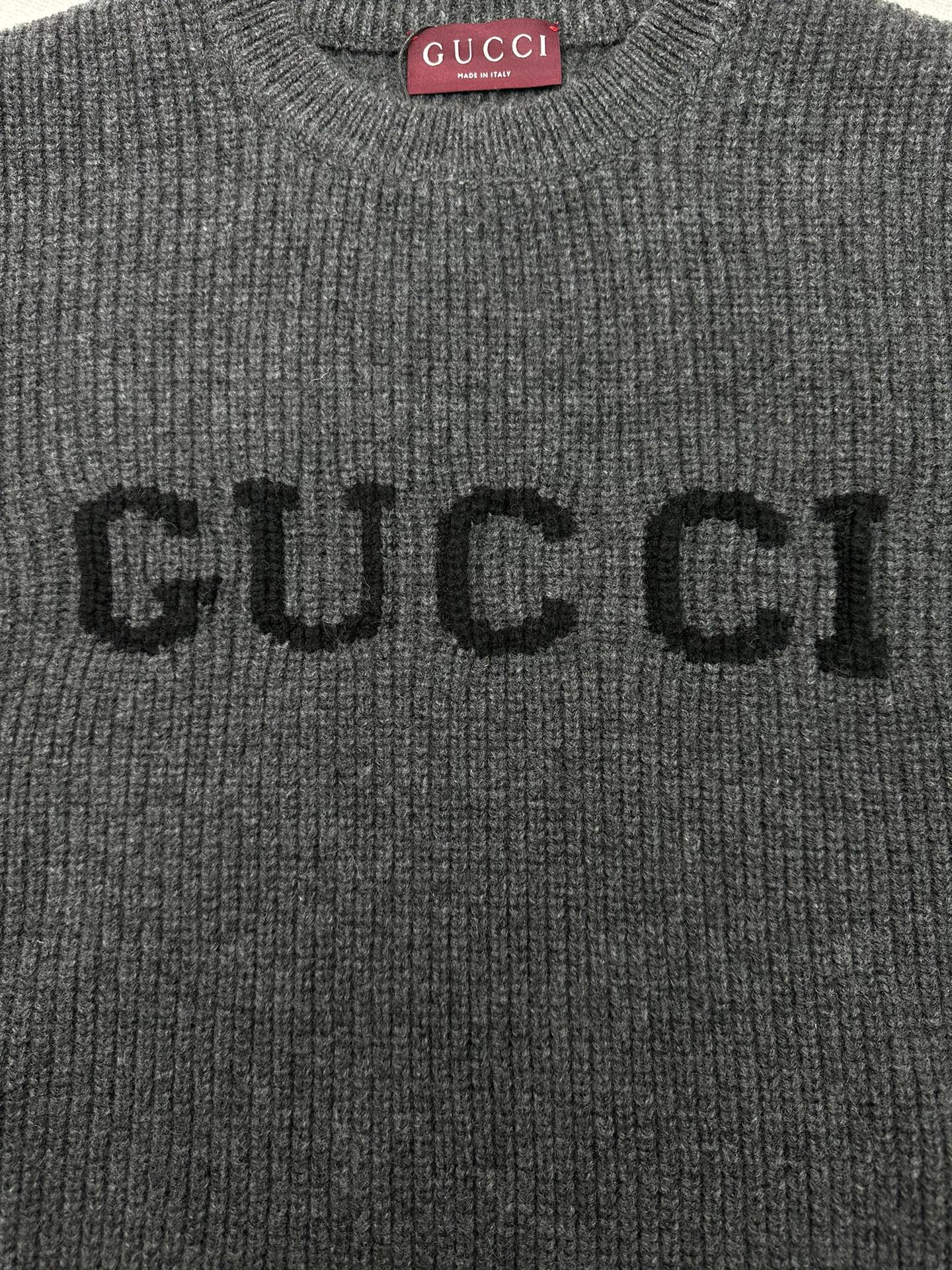 Gucci knit sweater front with embroidered GUCCI lettering