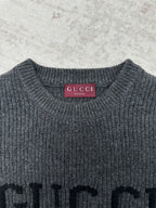 Gucci knit sweater neckline with pink GUCCI label