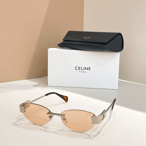 Sunglasses with gold-tone frame and light brown lenses with black case