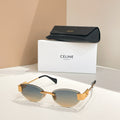 Sunglasses with gold-tone frame and dark gradient lenses with black case