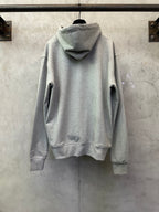 Light gray zip-up hoodie with attached hood and kangaroo-style pocket