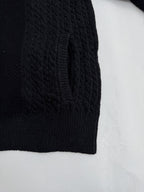 Versace black knit jacket side panel with ribbed hem and textured cable pattern