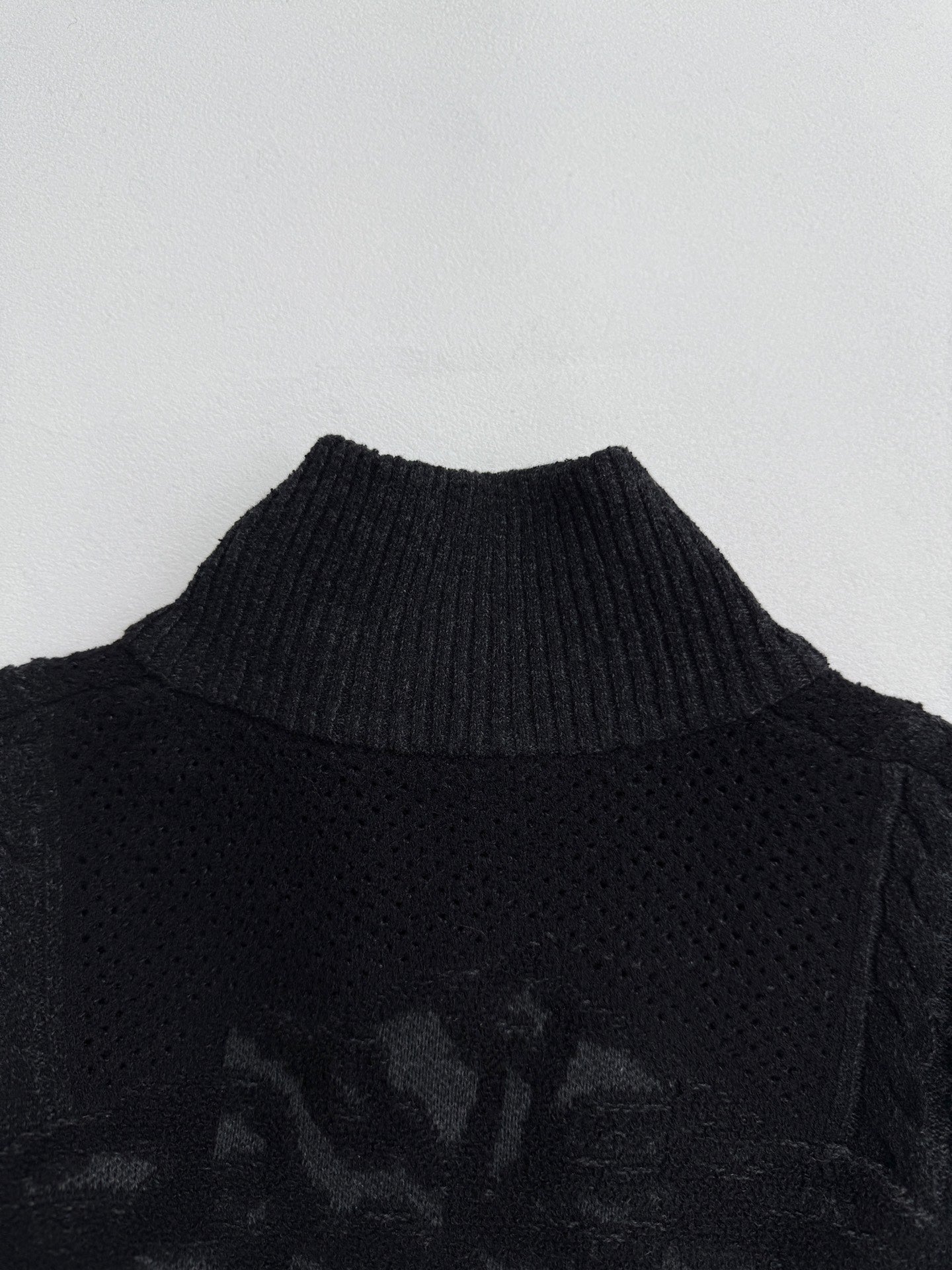 Versace black knit jacket with stand collar and subtle textured pattern