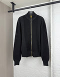 Versace black knit zip jacket with stand collar, full-length gold zipper, ribbed cuffs