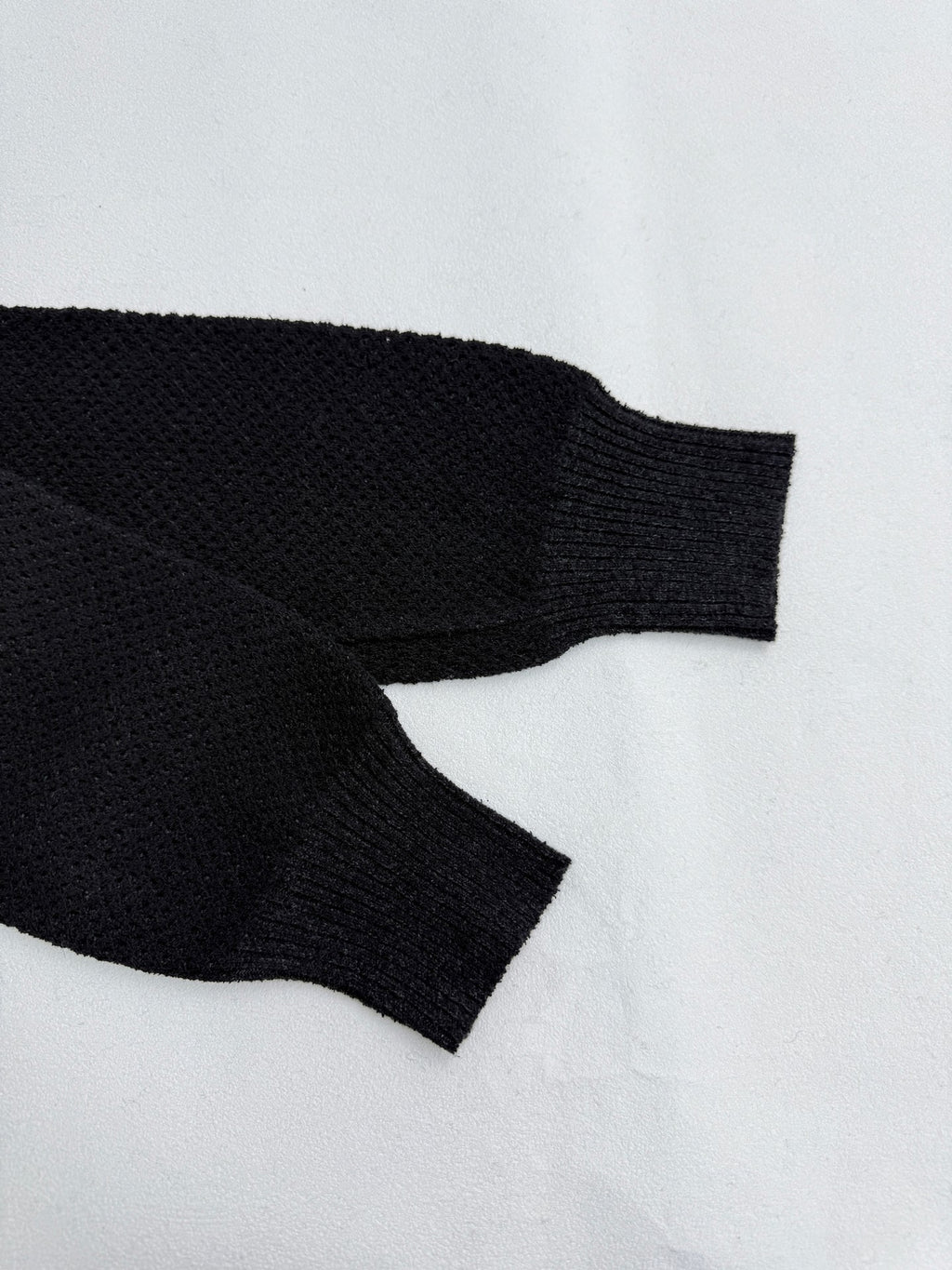 Versace black knit jacket sleeve cuffs with ribbed hem, long sleeves