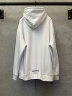White zip-up hoodie back view with hood and small chest logo patch