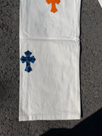Chrome pants with white fabric and orange top cross patch with blue lower cross patch