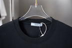 Black T-shirt neckline with interior Prada size label