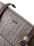 Dior taupe leather-look bag with embossed logo pattern and brown strap
