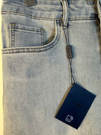 Light blue denim front pocket with label and hanging Prada tag