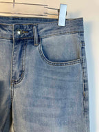 Louis Vuitton light blue denim pants, curved front pocket and belt loops