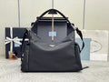 Prada black nylon handbag with top handles and side straps