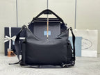 Prada black nylon shoulder handbag with front opening and adjustable straps