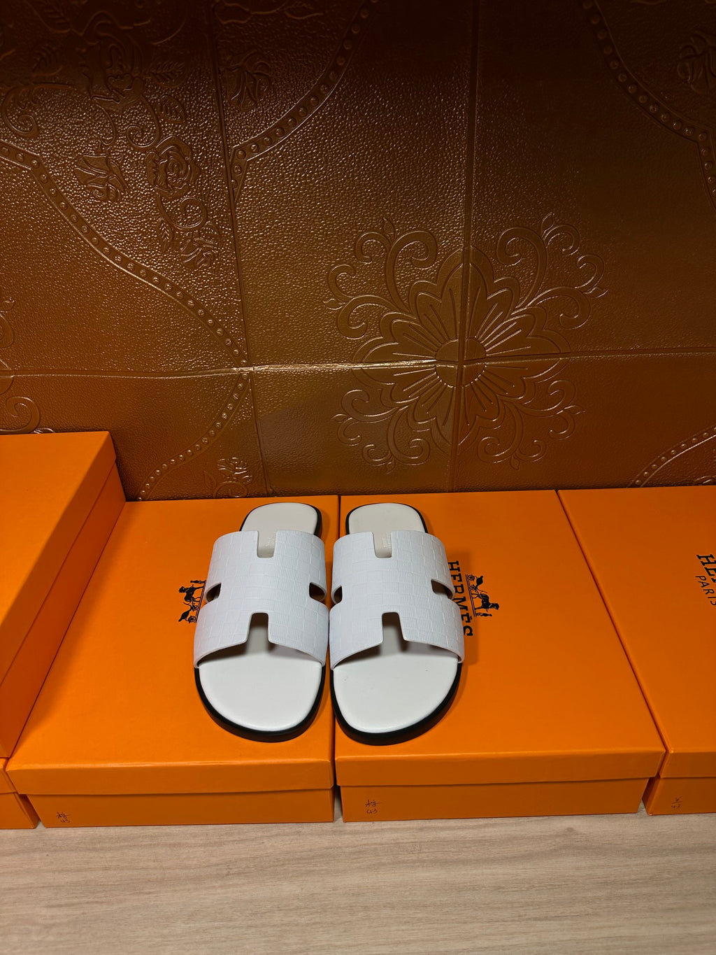 Hermes leather slide sandals, white with wide strap and cutout detailing