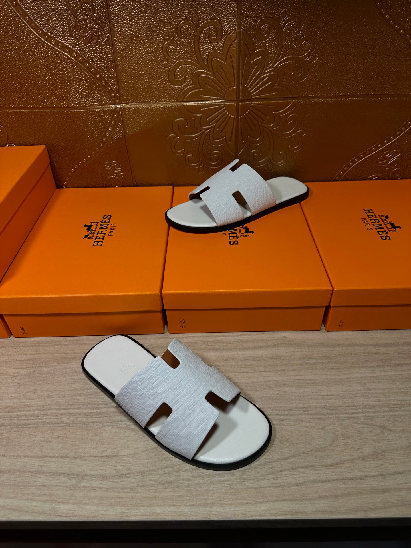 Hermes slide sandals, white leather straps with square cutouts; pair on box