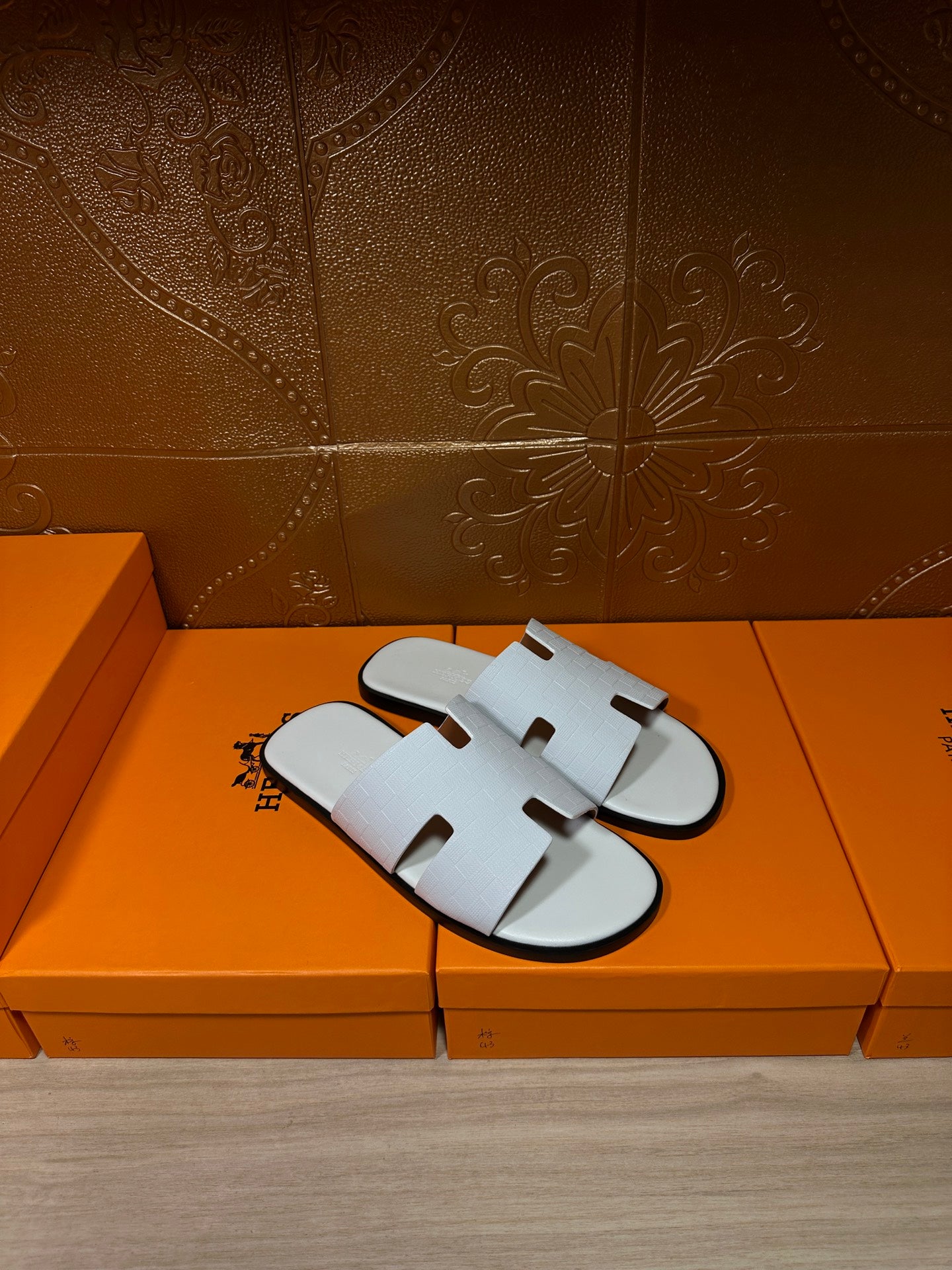 Hermes leather slide sandals in white, open-toe with chunky strap design